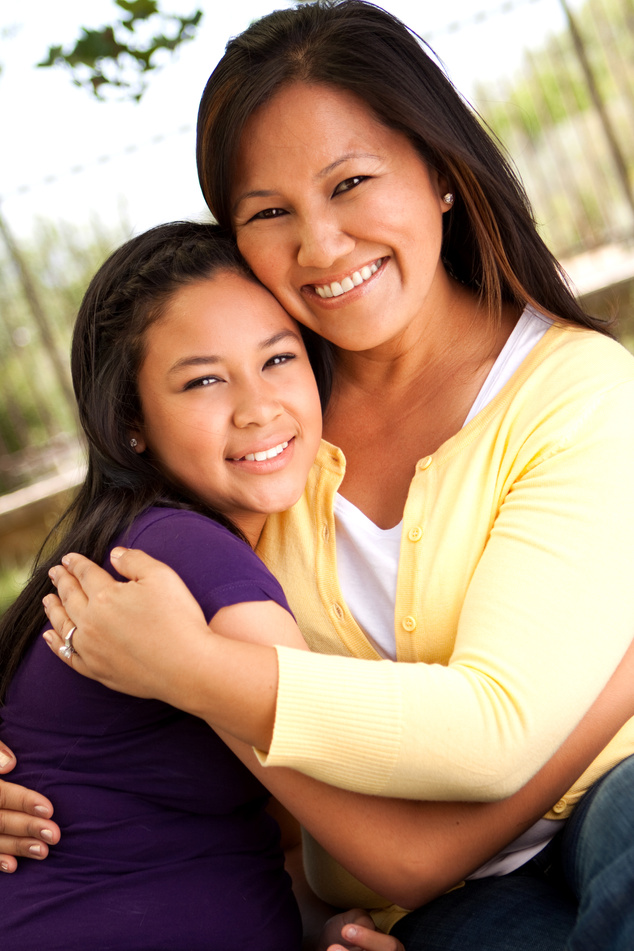 Asian Teenage Girl Smiling