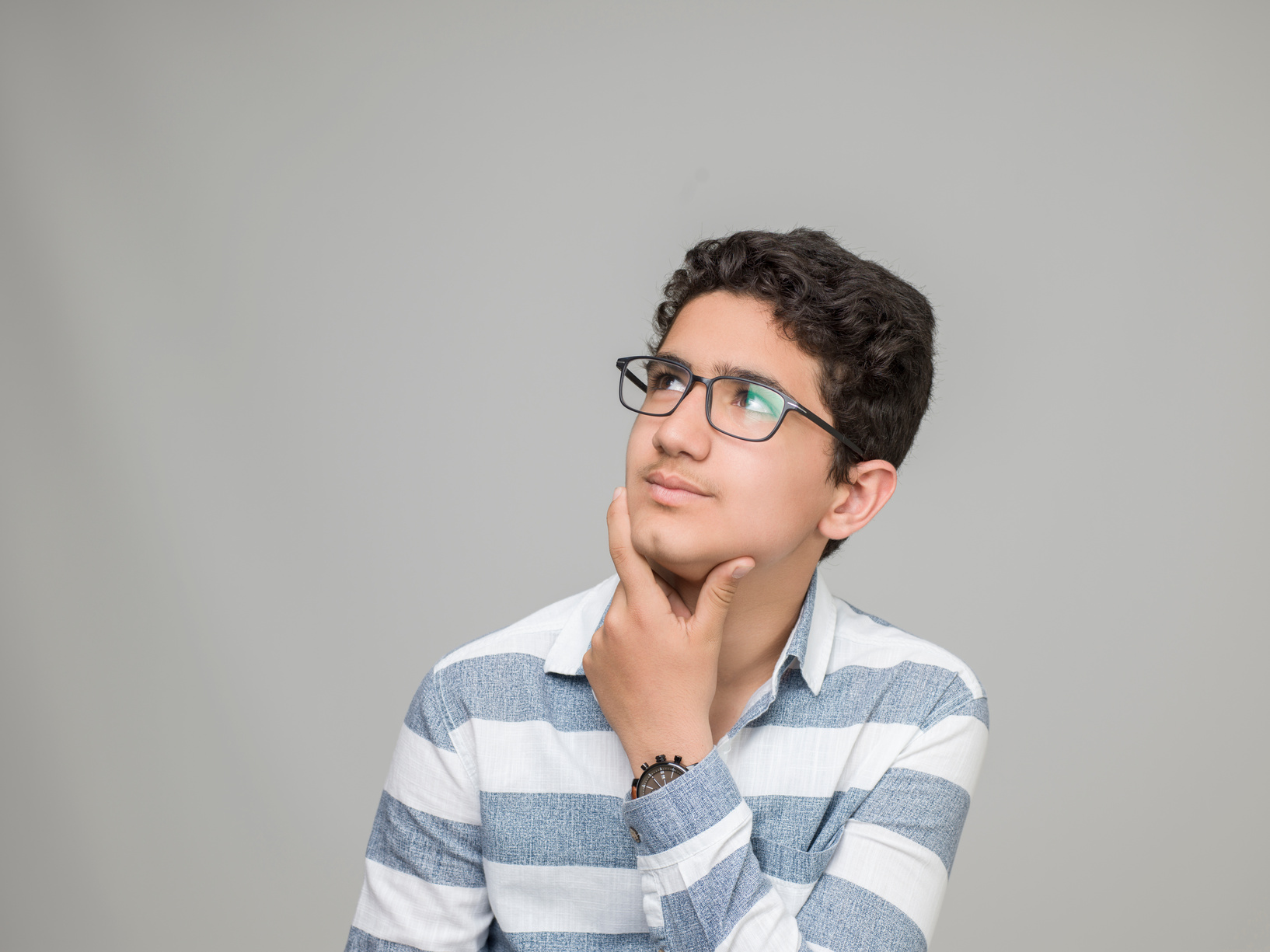 Teenage boy thinking